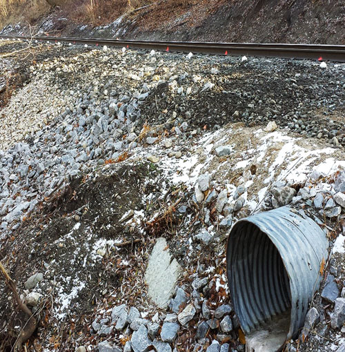 Sensors protecting track near a drainage basin. 